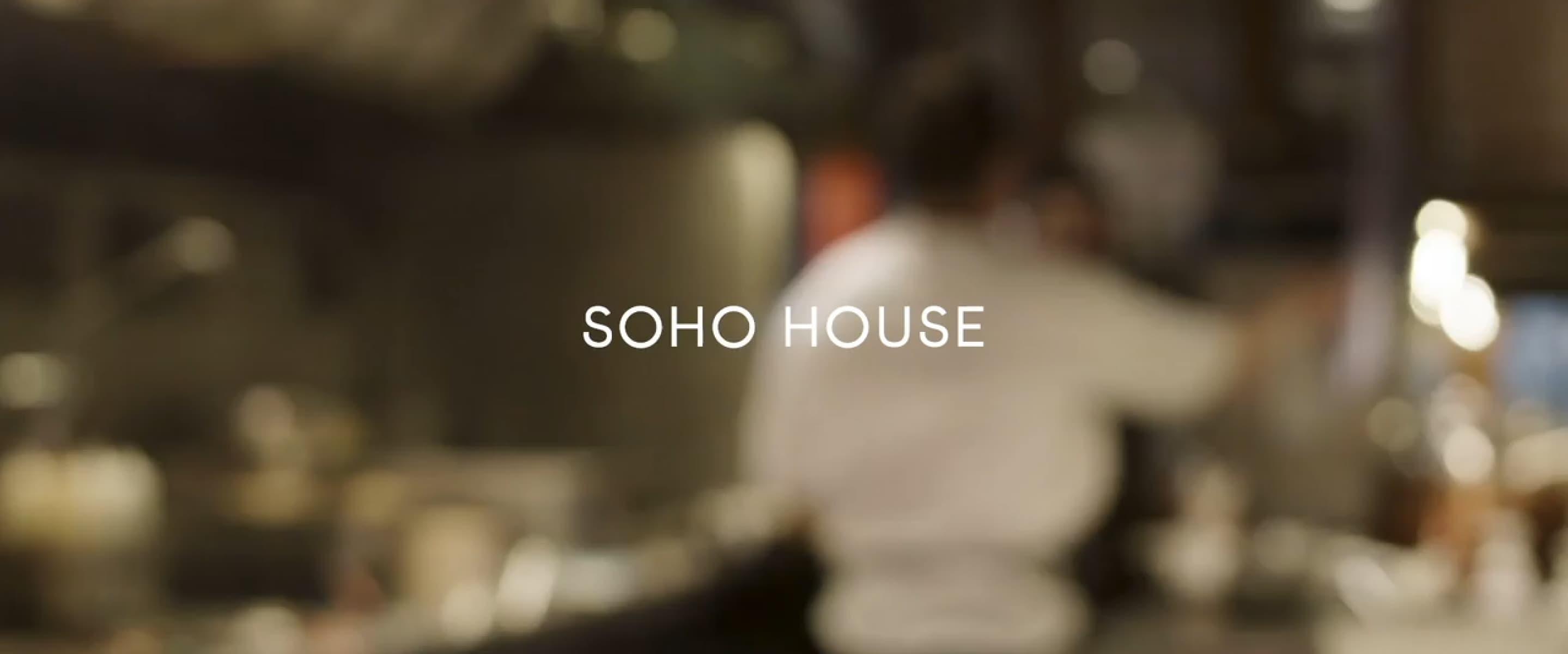 Blurred image of Soho House Video. Blurred image of a person in a kitchen wearing white.